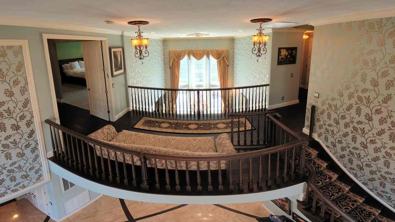 Interior balcony overlooking the two-story foyer