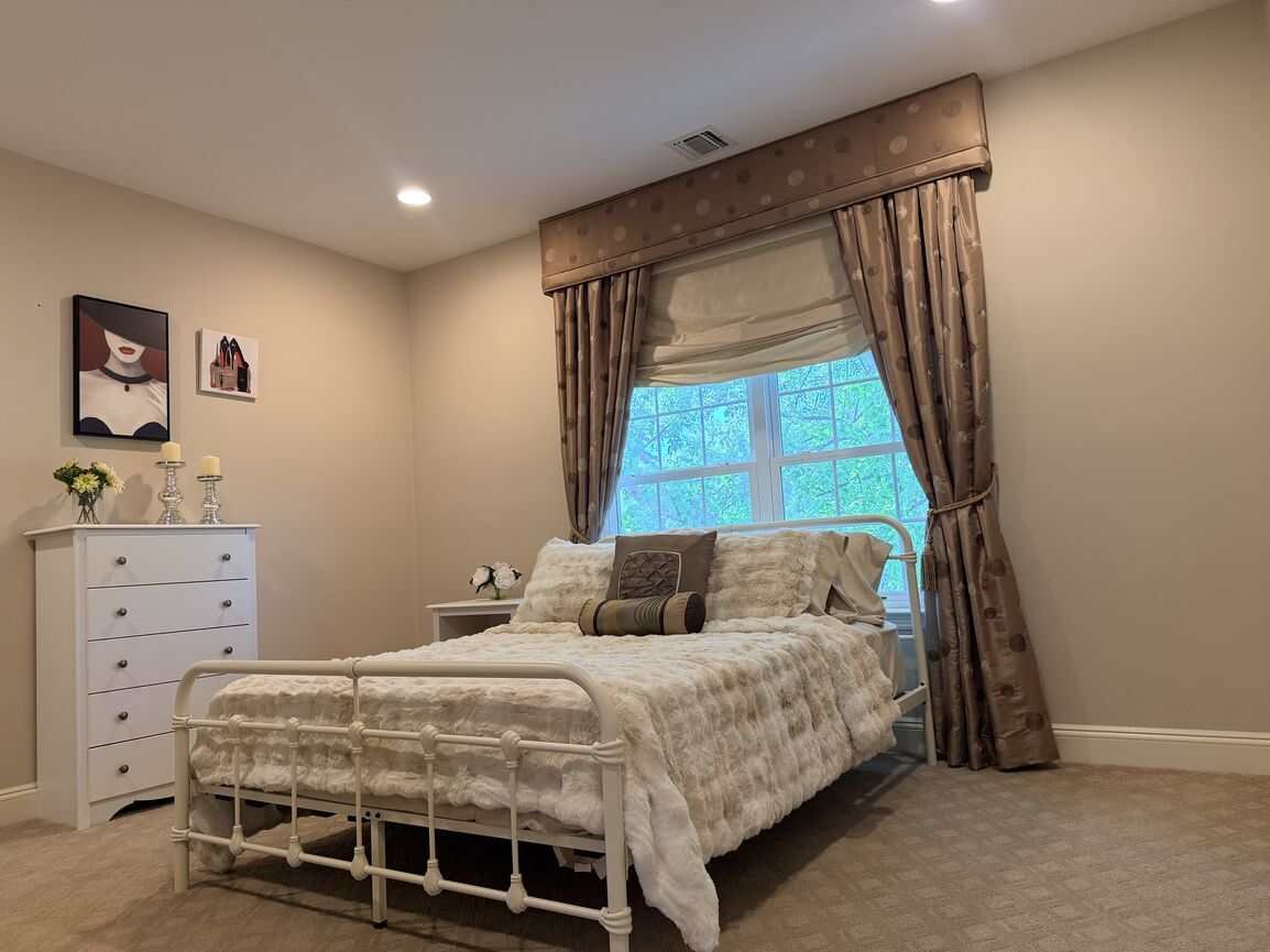 Second-floor secondary bedroom with en-suite access