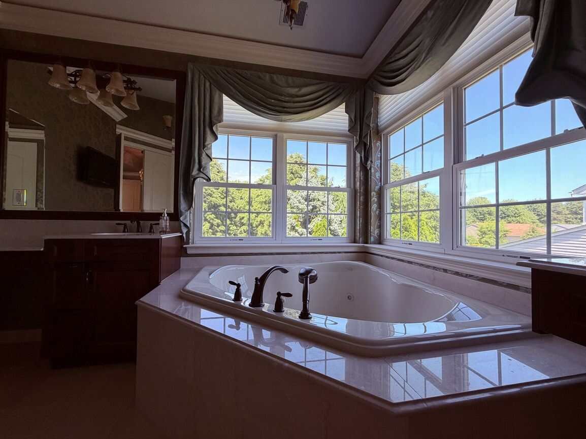 Primary en-suite bathroom on the second floor with dual vanity