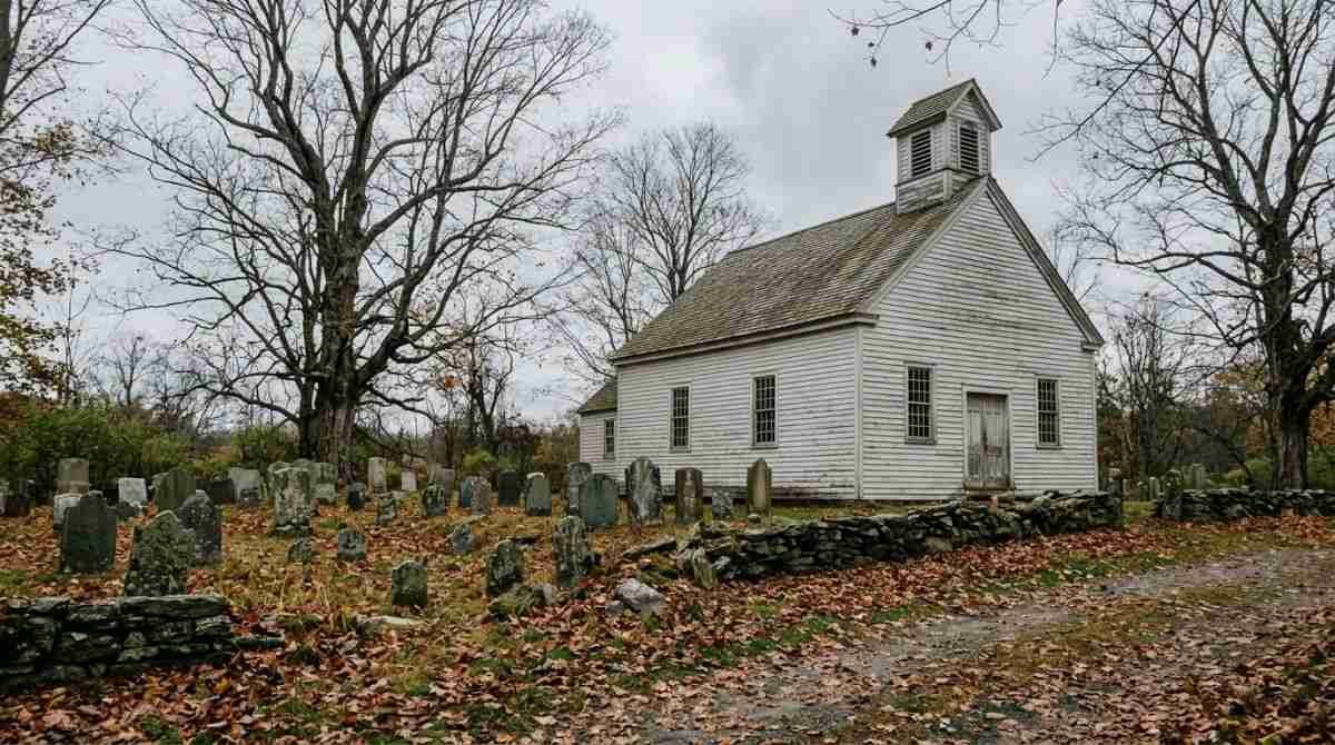 A colonial-era church and old cemetery in Setauket, a stop on historical society tours.
